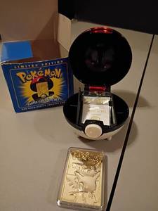 lot 1039 image: Pokemon 23k Gold Plated Trading Cards.  #25 Pikachu.