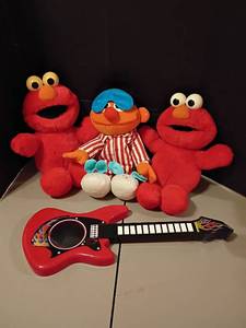 lot 1042 image: Elmos,  Ernie and Guitar