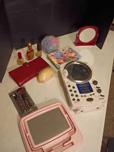 lot 1238 image: Bathroom Items.   Perfume, Mirrors, Water Resistant CD Clock Radio and More