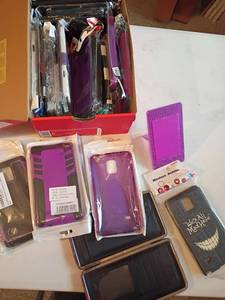 lot 1276 image: Wallet and a Bunch of Phone Cases.