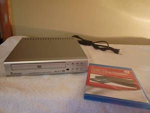 lot 1277 image: Another DVD Player with Cleaner