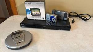 lot 1286 image: Mixed Electronics Bundle - Garmin GPS, Philips DVD Player, Casio Video Camera, and Vivitar Digital Camera