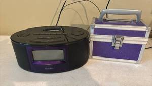 lot 1289 image: HoMedics CD Player Boombox Radio with Purple Aluminum Storage Case