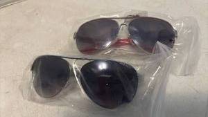 lot 1306 image: Sunglasses Red and Blue