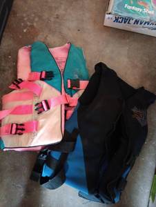 lot 2003 image: Adult XSmall and Adult SM life vest