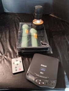 lot 2071 image: RCA Car Disc Player and glow in dark flashlights