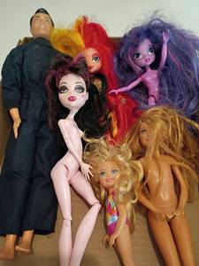 lot 2227 image: Ken, Barbies and More