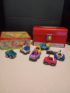 lot 2232 image: Fisher Price Tool Box and Tomy Cars inside Cracker Jack Tin
