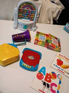lot 2254 image: Fisher Price, Baby Books and More