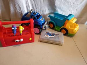 lot 2307 image: Toy 4x4 Truck, Dump Truck and Electronic Tool Box (missing pieces) and More