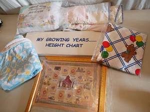 lot 2311 image: Baby Items. Growth Chart, Blankets, Sheet and More