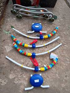 lot 2312 image: Baby Einstein Parts for Jumper and Winnie the Pooh Jumper