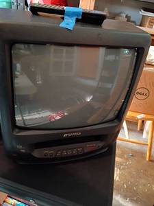 lot 2314 image: Sansui 14in. T. V. with VHS Player