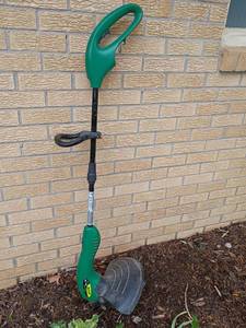lot 2401 image: Twisted Edge Weedeater
