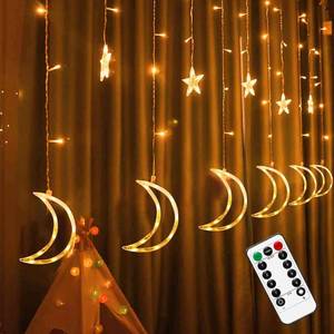 lot 62877 image: FUNPENY Star Moon Curtain String Lights, 138 LED Window Lights with Remote Control, Warm White Fairy Lights with 8 Modes for Indoor, Wedding, Party, Bedroom, Patio Lawn, Ramadan Decorations - Retail $20