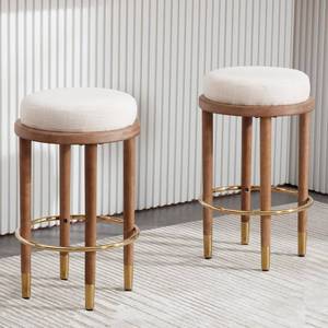 lot 242078 image: Retails for $160 BESTANO 26  Rustic Backless Bar Stools Set of 2 with Wooden Legs, Round Counter Height Stools Bar Chairs Kitchen Bar Stools, Farmhouse Linen Upholstered Top Stool, Beige