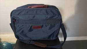 lot 60904 image: American Tourister Navy Blue Soft Side Overnight Bag - Retail $25