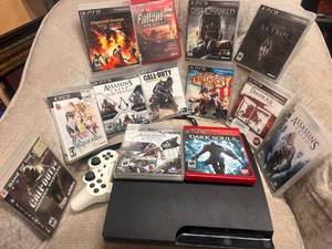 lot 24 image: PlayStation 3 Console Bundle with Controller and 12 Games