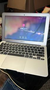 lot 90 image: Apple MacBook Air Laptop Computer  Charger and holds charge