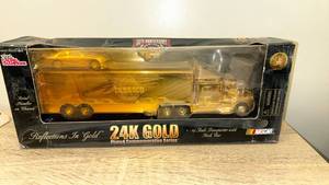 lot 131 image: Racing Champions 24K Gold Plated NASCAR Transporter Truck