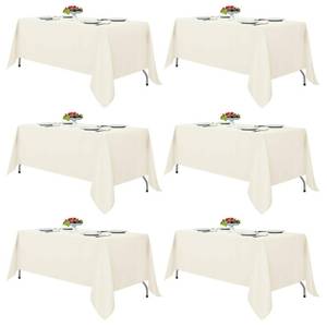 lot 64 image: Fitable Ivory Tablecloths for 6-8 Foot Tables, 6 Pack - 70 x 120 Inches - Reusable and Washable Table Clothes, Polyester Fabric Table Covers for Wedding, Party, Banquet - Retail $58