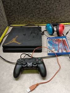 lot 142 image: PlayStation 4 Slim Console Bundle with Controller, NBA 2K22, and Gaming Headset - Ps4 fails to power on - Working Controller