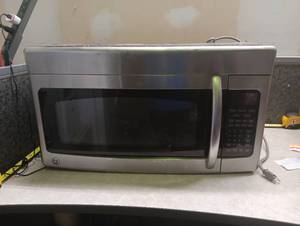 lot 187 image: GE Stainless Steel Countertop Microwave Oven - Works