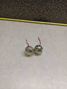 lot 212 image: Silver Jingle Bells with Red Ribbons