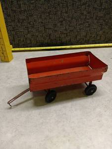 lot 234 image: ERTL Co. Red Metal Farm Wagon Toy - Dyersville Iowa