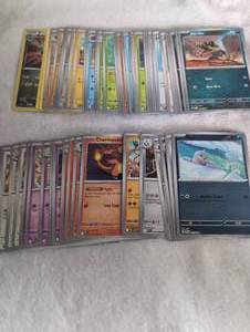 lot 619 image: Common and Uncommon Pokemon Trading Card Collection with some Holos - 54 ct