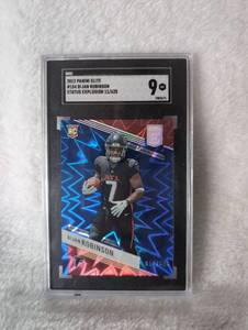 lot 1002 image: 2023 Panini Elite Bijan Robinson Status Explosion Rookie Card #104 SGC 9
