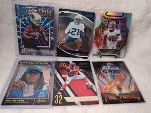 lot 1017 image: Modern NFL Trading Card Collection Lot - Marvin Harrison Jr., D.J. Giddens, Devin White, Emmitt Smith - 6 ct