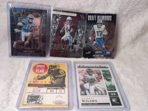 lot 1021 image: Modern NFL Football Trading Card Collection -&nbsp&nbspJosh Downs, Larry Fitzgerald, Puka Nacua, Keenan Allen, and Garrett Wilson - 5 ct