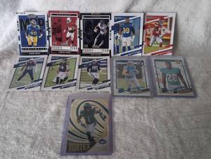 lot 1025 image: NFL Collection Cards -11 ct - Aaron Donald Rondale Moore Nico Collins Ljarius Sneed Devin McCourty Justin Tucker Deforest Buckner Sam Laporta Devon Achan