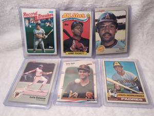 lot 3027 image: Late 1980s Baseball Card Collection with Notable Players - 6 ct - Kirby Puckett All-Star card, Reggie Jackson Power card, 1988 Record Breaker card, Luis Salazar, Joey Cora, and Enzo Hernandez Padres