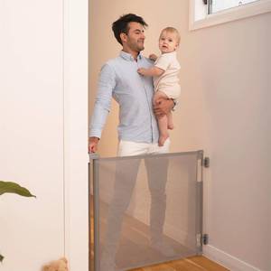 lot 4701 image: Retractable Baby Gate 33x55 in, Mesh, IndoorOutdoor, One-Handed