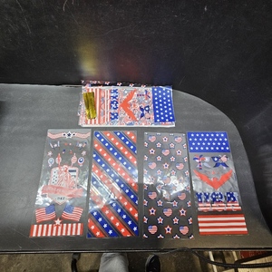 lot 6622 image: 50PCS 4th of July Cellophane Treat Bags, Clear Patriotic Plastic Goodie Candy Bag with Twist Ties for Independence Day Memorial Day Birthday Party Favor Suppl (4 Style