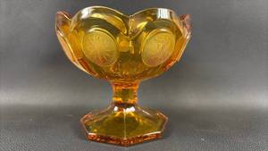 lot 21 image: Fostoria Amber Glass Footed Compote Bowl with Medallion Pattern