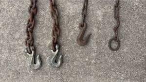 lot 36 image: Heavy Duty Cargo Load Binding Chains with Hooks Largest is 12 Foot Long with 2 inch Links
