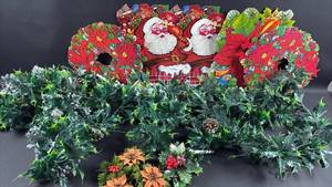 lot 61 image: Vintage Christmas Holiday Garland with Santa and Poinsettia Paper Decorations