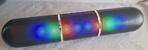 lot 66 image: LOUD & Clear Sound Naxa Wireless Speaker With LED Flashing Lights That Flash To Beat of Music Approximate Length 8 Inches