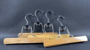 lot 76 image: (4) High Quality Wood and Chrome Trouser Hangers