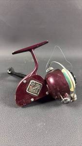 lot 129 image: Vintage Shakespeare Model 2052 Reel in Maroon.