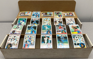 lot 211 image: Lot of 1850 1983 Topps Baseball Cards including many stars, Hall of Fame, and rookie cards.