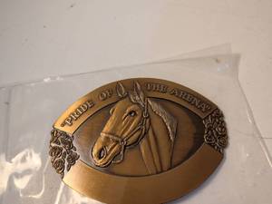 lot 24 image: 1977 Pride of the Arena Horse Racing Belt Buckle by Farmland Industries