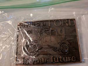 lot 25 image: Ford Model T Bronze Belt Buckle