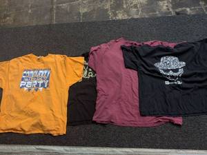 lot 128 image: Breaking Bad and Community Block Party T-Shirt Bundle Size 3XL