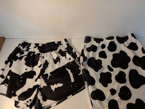 lot 160 image: Black and White Cow Print shorts and skirt Size Medium
