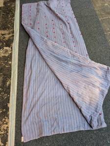 lot 181 image: Purple blanket with red nots and sun bleached