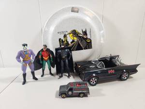 lot 157 image: Batman Action Figure Collection with Batmobile and Vehicles and Vintage Frisbee